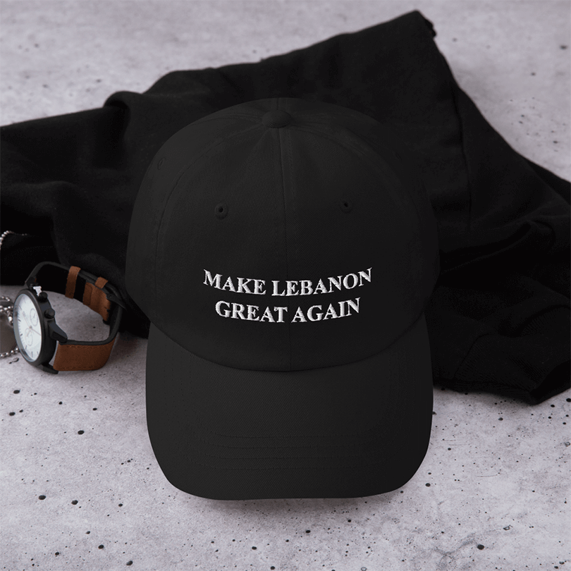 A black cap with 'Make Lebanon Great Again' written on it, as requested by the client.